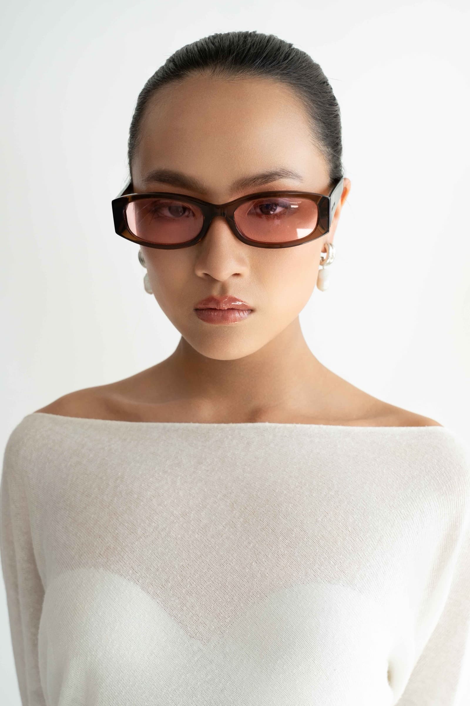 The Lady Pink sunglasses worn, front view