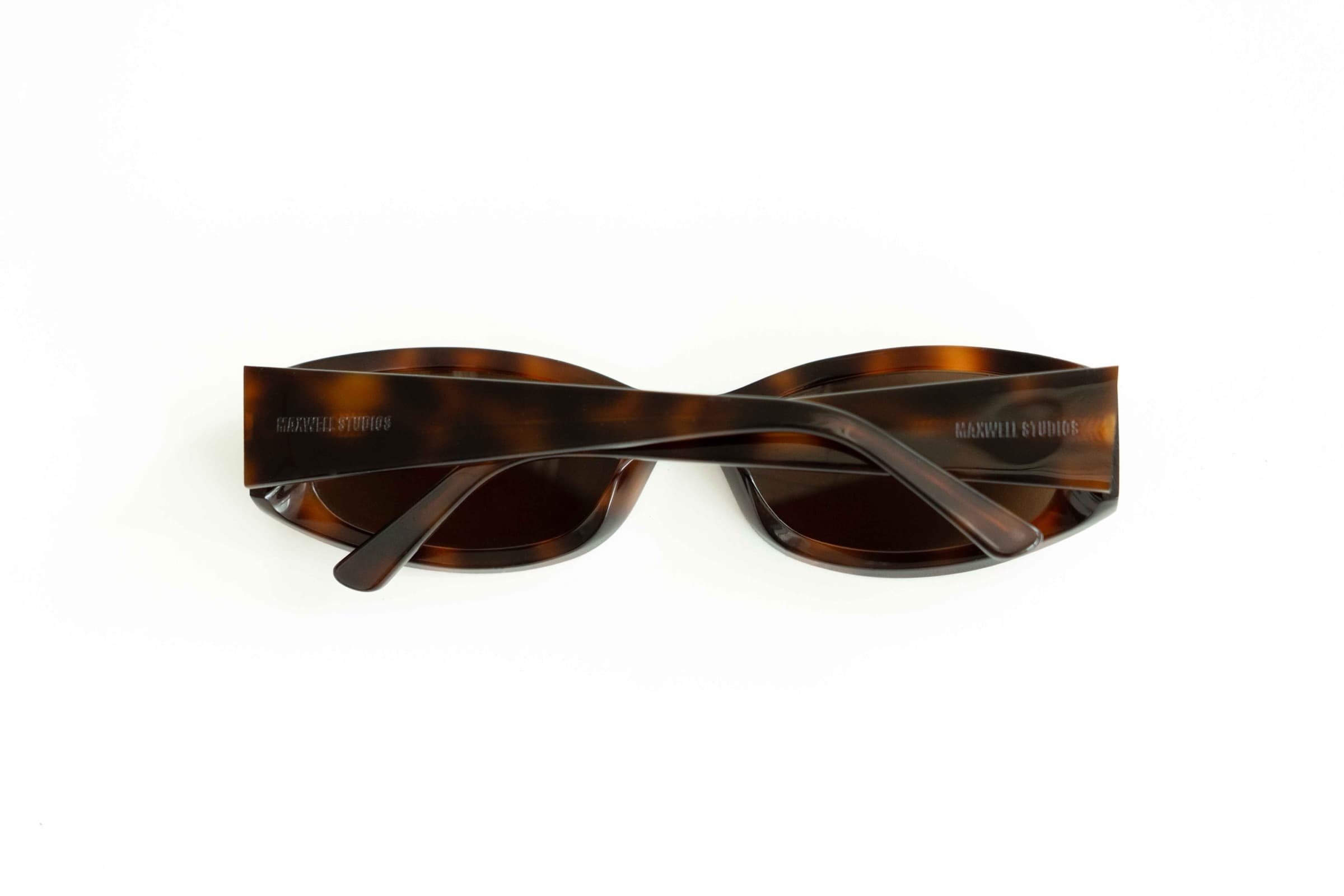 The Lady Tortoise sunglasses, back view on a clean background