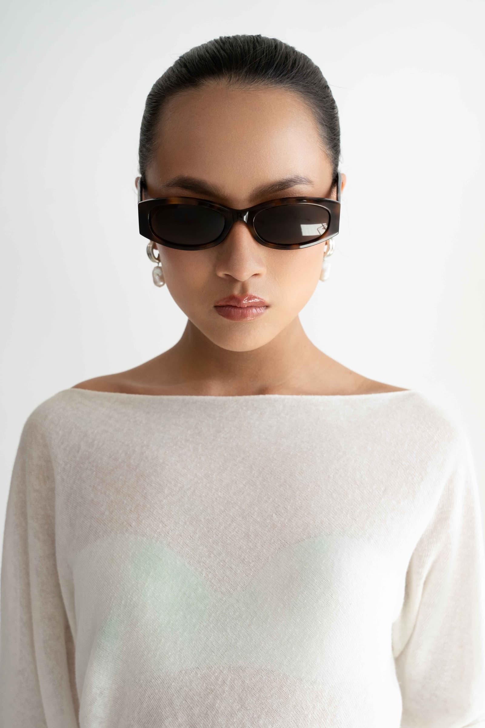 The Lady Tortoise sunglasses worn, front view