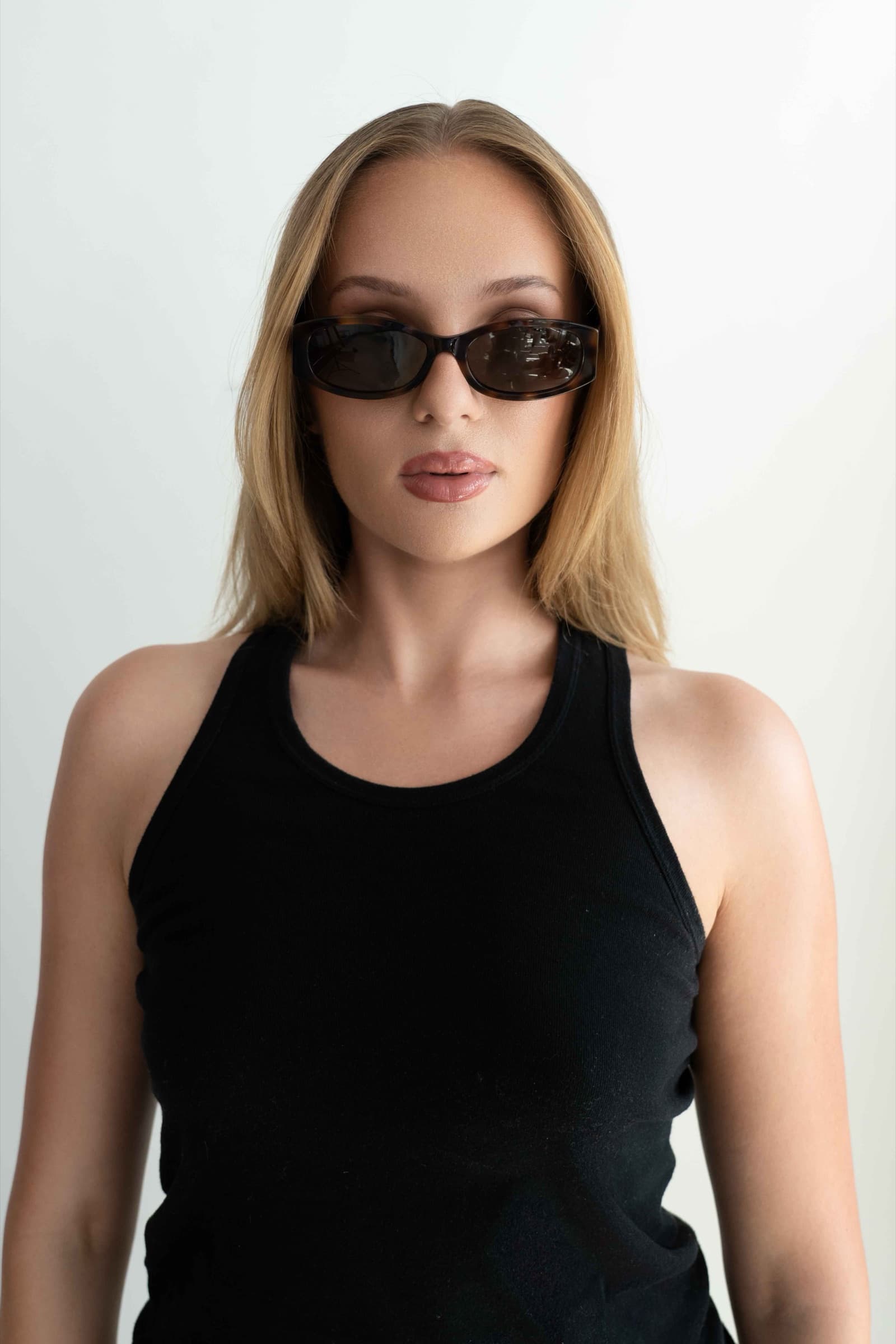 The Lady Tortoise sunglasses worn, front view