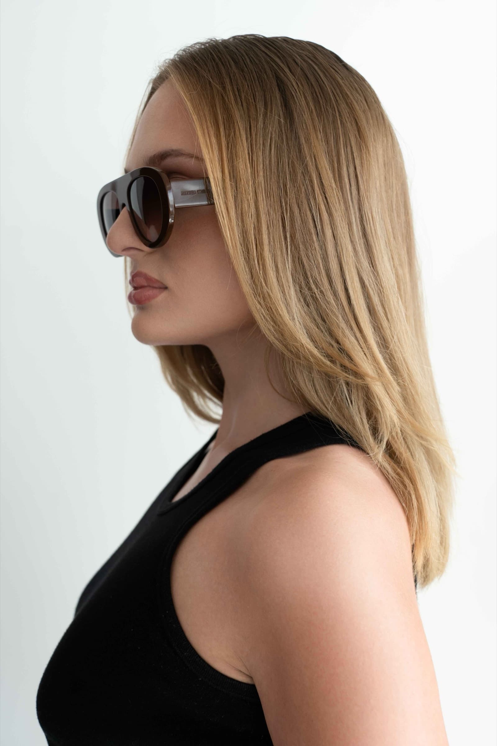 The Muse Brown sunglasses worn, side profile